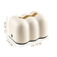 Cream cloud-style tissue box holder with two cutout nostril details and black base trim