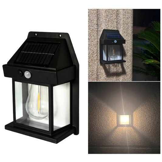 Black solar wall light with glass lantern and built-in motion sensor glow