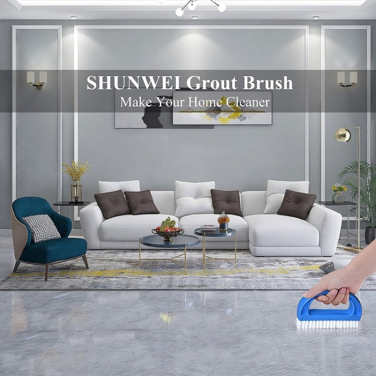 Blue D-shaped cleaning brush with white bristles held for floor edge scrubbing
