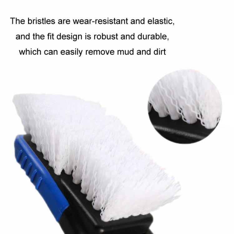Stiff white brush bristles on a blue-and-black cleaning tool, angled view