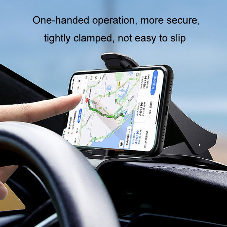 Black phone holder mounted on car dash, secured clamp for map navigation