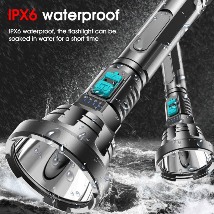 Rugged LED flashlight with teal panel and fluted head, silver and black finish.