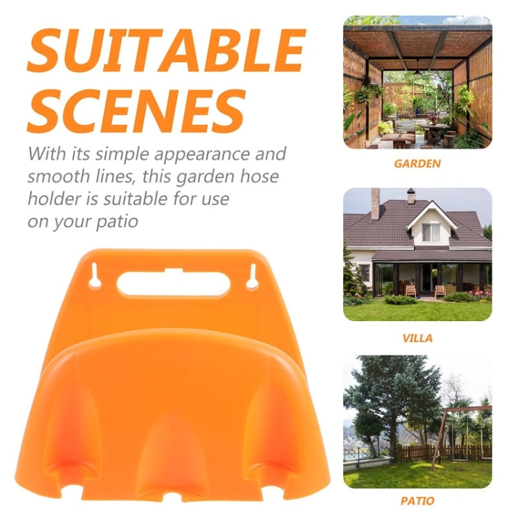 Orange plastic wall-mounted hose holder with dual side hooks and top carrying slot