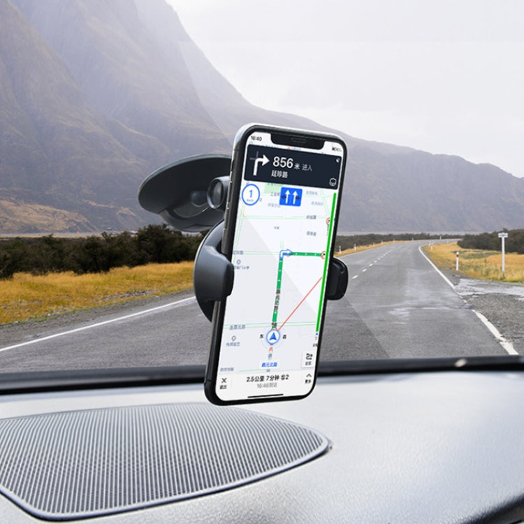 Black suction-cup car phone mount holding a smartphone with navigation screen