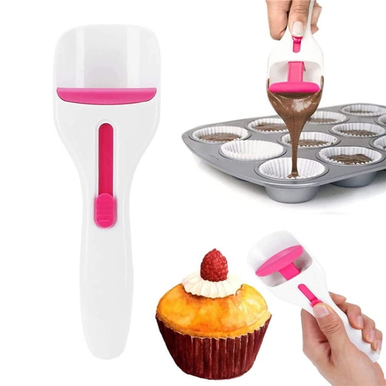 Cupcake batter scoop and sauce pusher with white body and pink silicone head