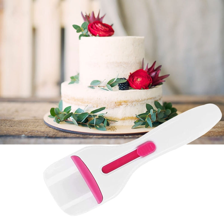 Cupcake batter scoop spoon with long white handle and pink silicone insert