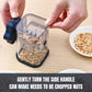 Manual nut crusher chopper in clear cup with navy handle, held by hands