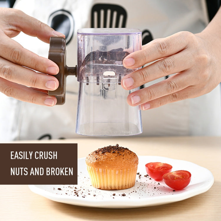 Manual nut crusher chopper with clear cup and brown side handle