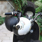 Motorcycle helmet in black and silver with mounted lock area near chin