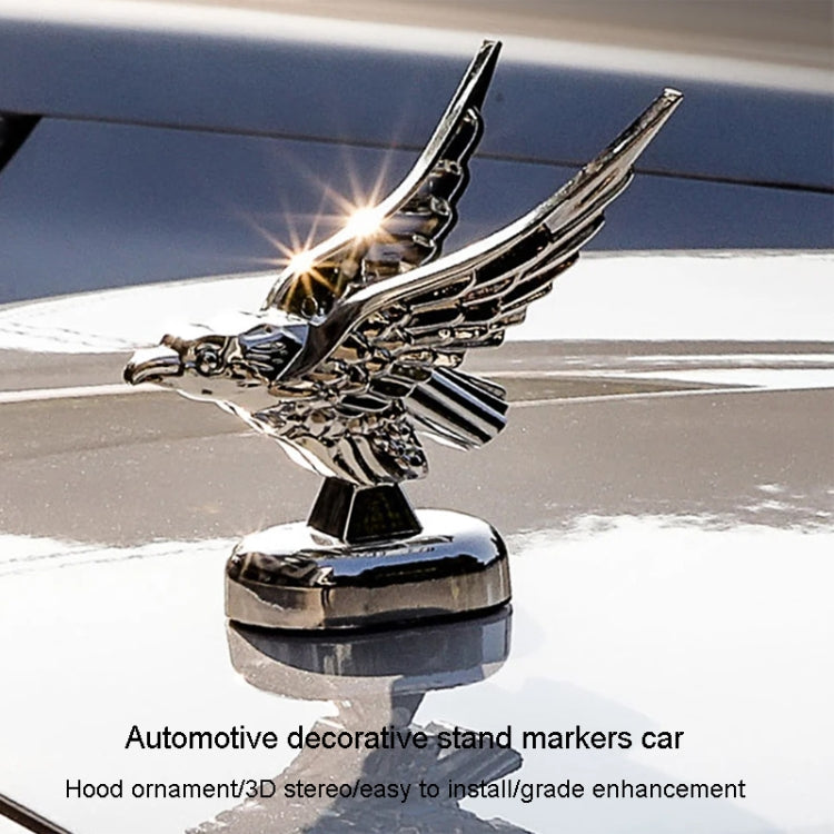 Chrome eagle wing hood ornament on protective stand marker for car