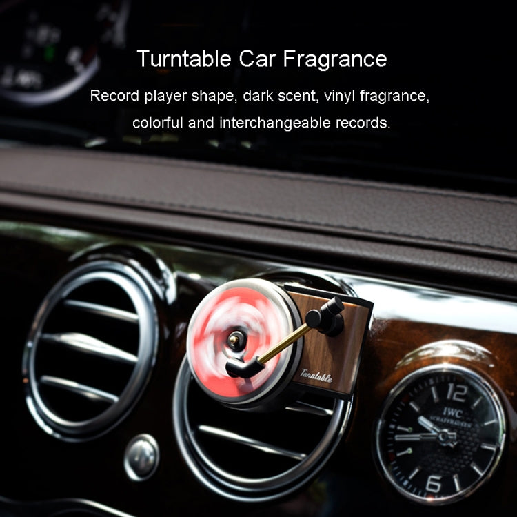 Car vent fragrance diffuser with rotating vinyl disc ornament and gold stem