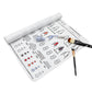White silicone manicure pad palette with nail design chart and nail polish tools nearby