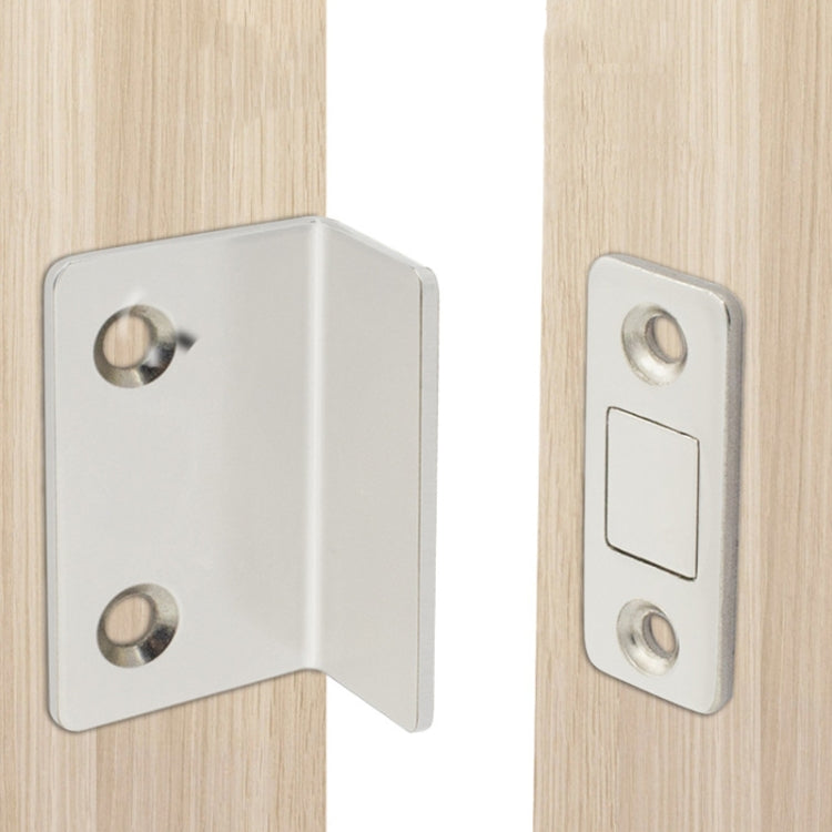 Silver magnetic suction cabinet door brackets mounted on light wood