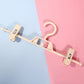 360° rotatable pants hanger with anti-slip clips and curved hook, milk-white and gray
