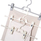Cluster of rotatable pants hangers with anti-slip clips in white and gray