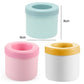 Cylindrical silicone ice cube molds in blue and pink, top openings shown