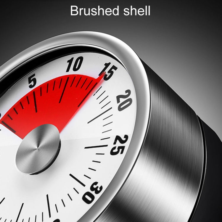 Brushed steel mechanical timer with close-up red dial segment and silver knob