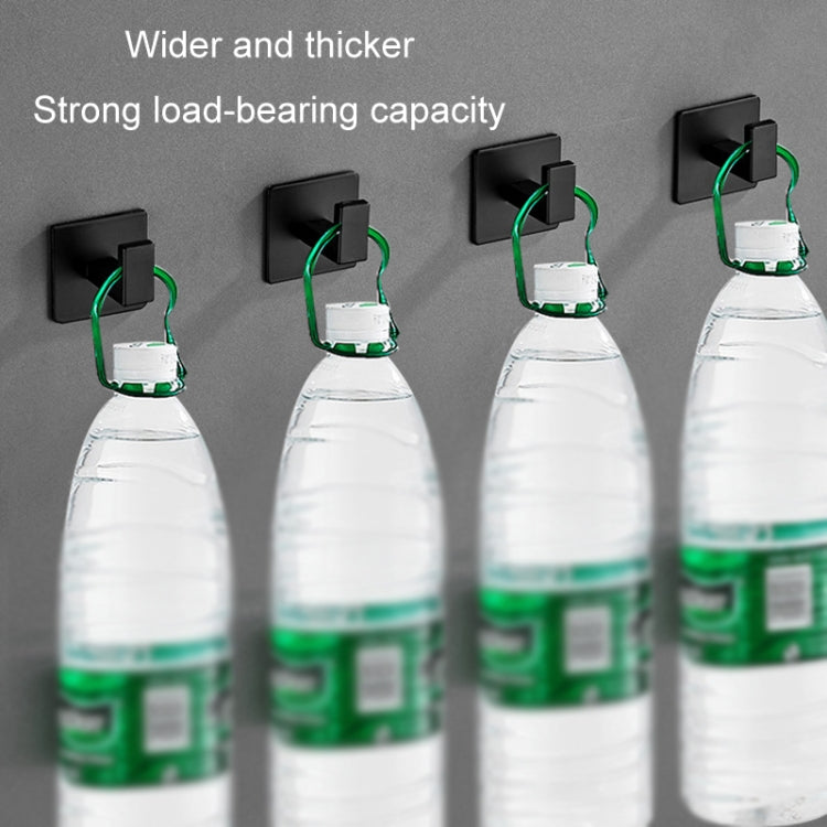 Black wall hooks holding hanging bottles with sturdy open U-shaped hook