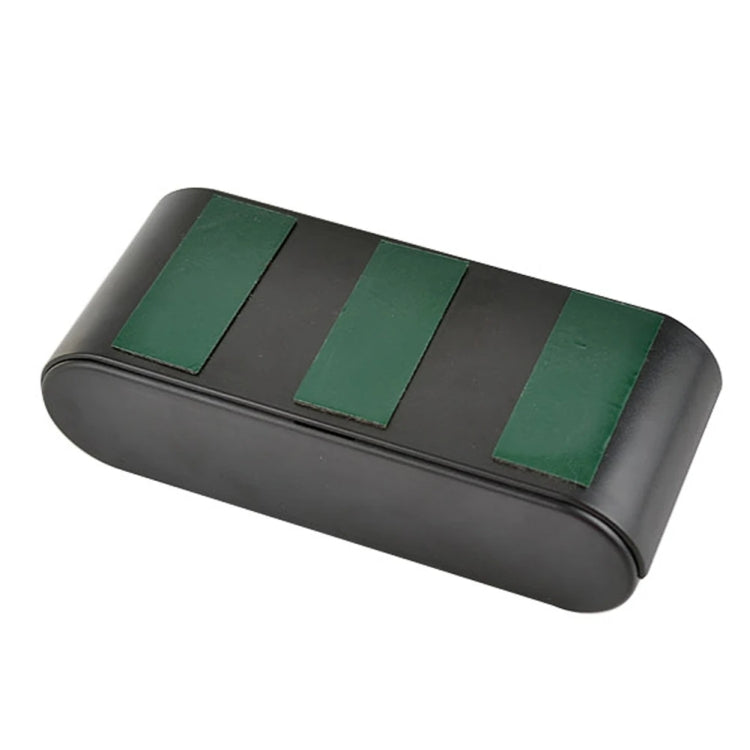 Car storage box with ridged top and three green rectangular inserts on the tray