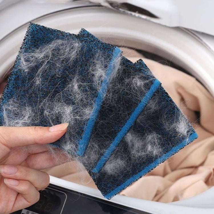 Washing machine hair remover pad, blue stripe and dark fuzzy sponge held near washer drum.