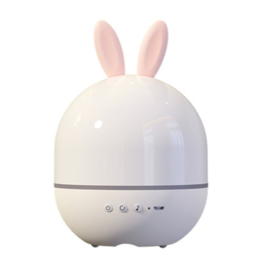 White rabbit-shaped projection night light with control buttons on the front panel