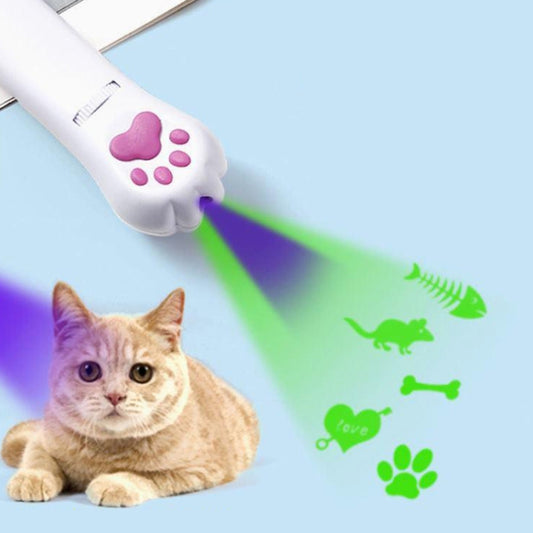 USB rechargeable LED pet projector toy projecting green and purple light patterns
