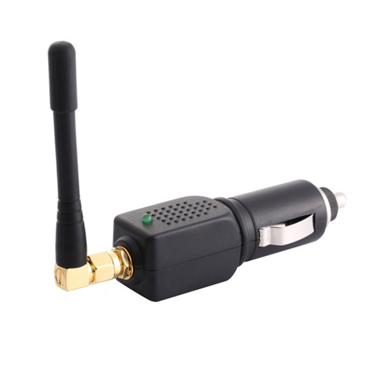 Black car cigarette lighter jammer with tall antenna, gold socket, and green status light