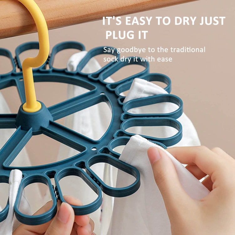 Blue round sock hanger with 20 clips, yellow hook, holding white socks