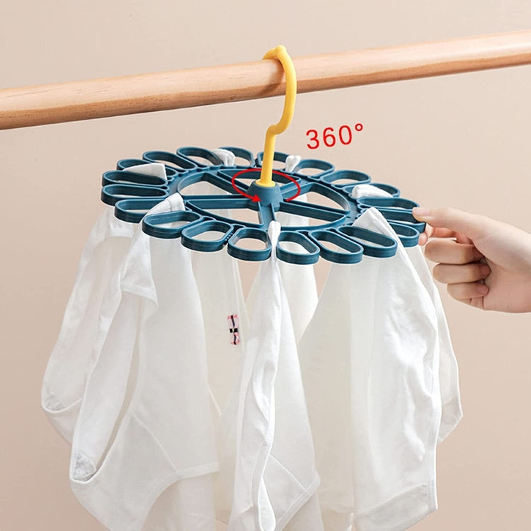 Blue round sock hanger with 20 clips and yellow hook, holding white socks