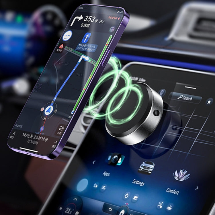 Magnetic car phone holder with suction cup base, securing smartphone on dashboard.