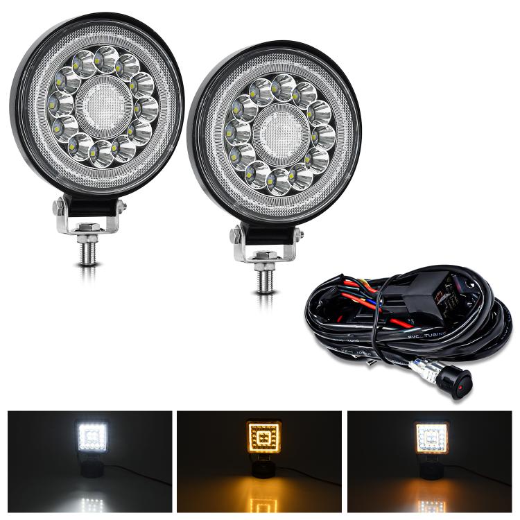 Pair of 4-inch round LED work lights with mounting bracket and wiring harness