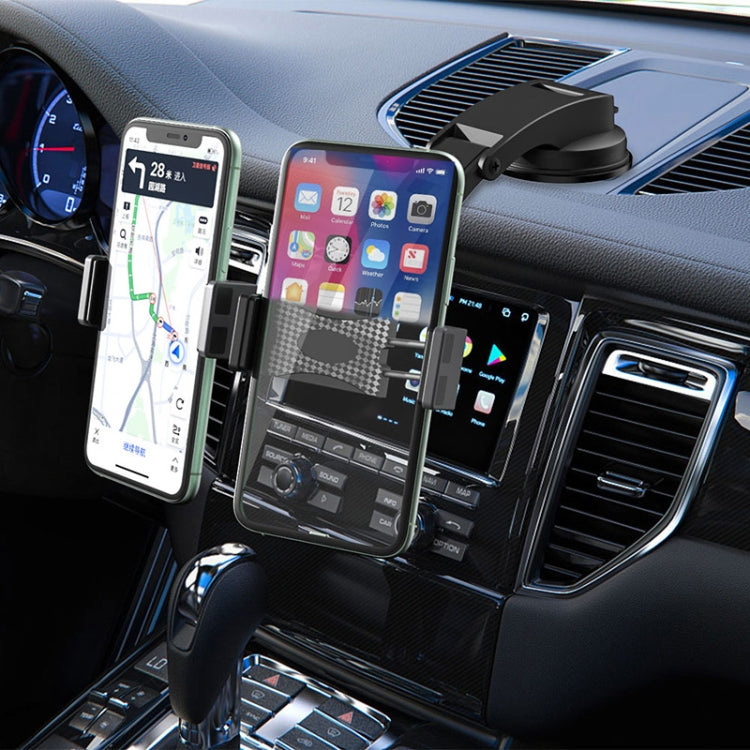 Black car phone holder with two arms gripping phones on the dashboard