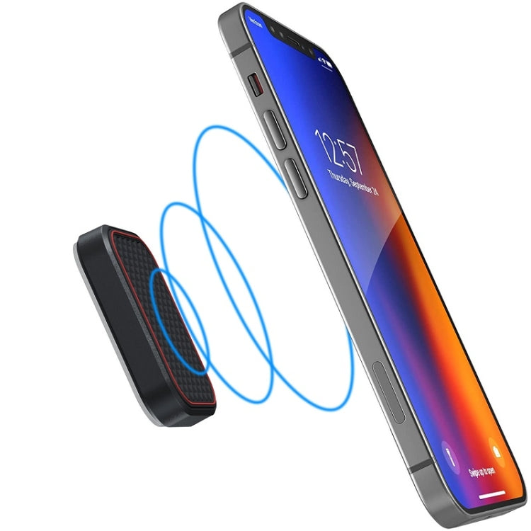Black magnetic phone holder with red trim, pulling in a smartphone