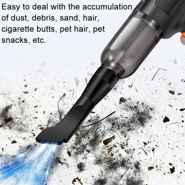 Handheld car vacuum cleaner nozzle removing dust and debris, showing airflow cleaning