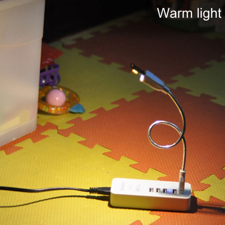 Warm white USB emergency light module with attached cable, compact design