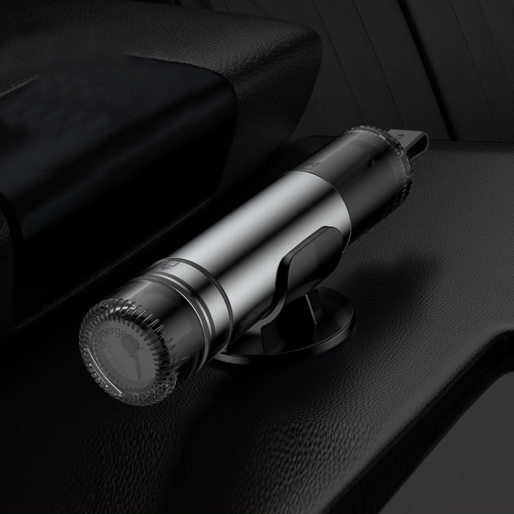 Car emergency escape hammer with dark handle and front impact head, lying on seat.