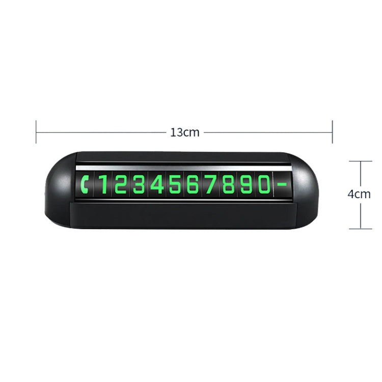 Black number display card showing green digits, with rounded end caps