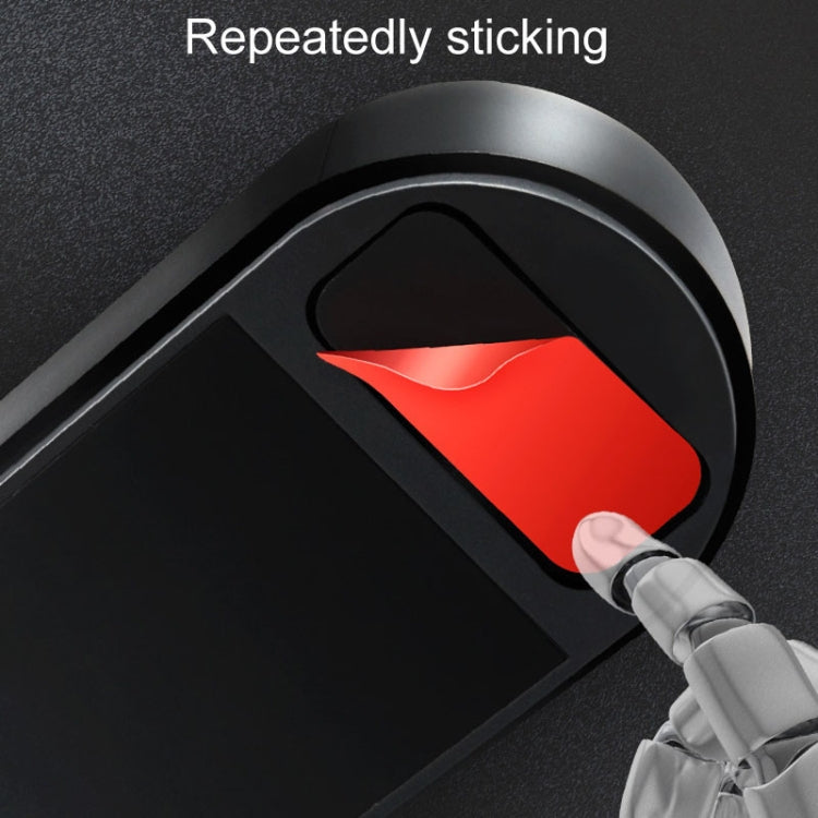 Black number display card slot with red number sticker being pressed in