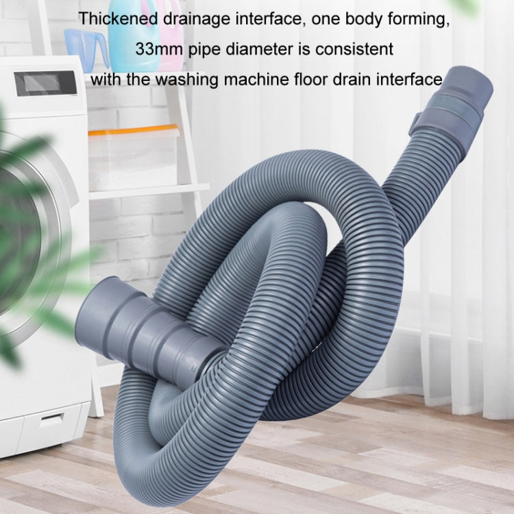 Gray-blue corrugated washing machine drain hose with ribbed coil and outlet end