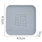 Light gray square silicone door bumper pad with embossed protective logo, 4.5 cm
