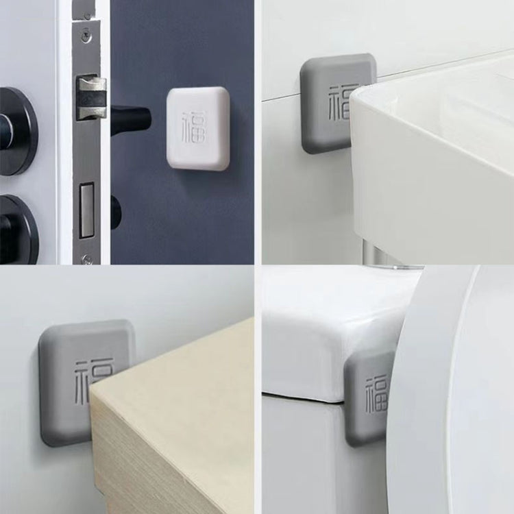 Gray square silicone door bumper pads, anti-collision protectors on door and cabinet edges