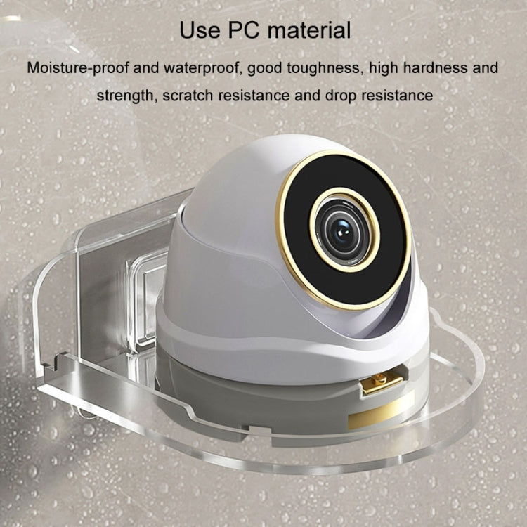 Transparent no-punch camera wall bracket with circular mount and clear shelf