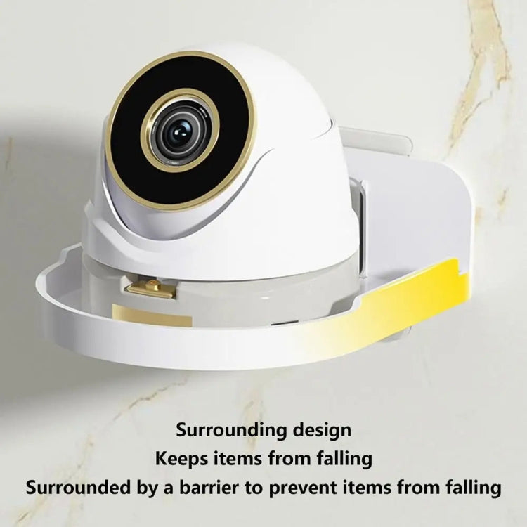 Transparent wall-mounted camera bracket with white base holding a security camera close-up