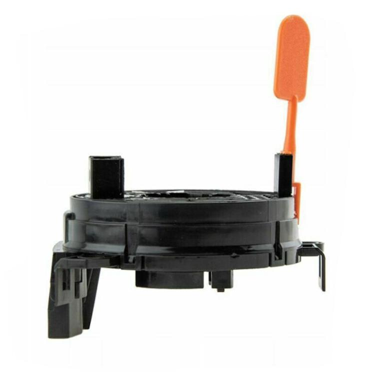 Black clock spring coil with exposed orange release lever