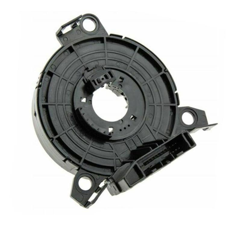 Black clock spring coil with central contact ring and mounting holes