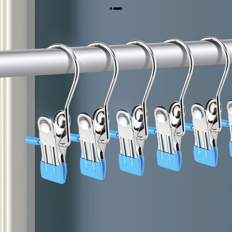 Multiple stainless steel laundry drying clips on a bar, blue anti-scratch tabs