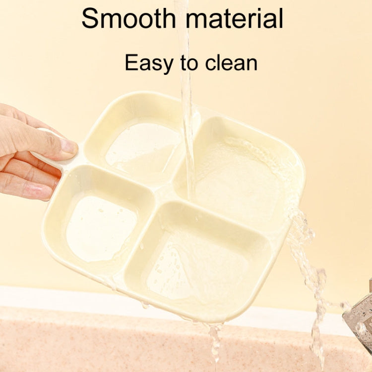 Cream quad-compartment dish tray; smooth surface for easy cleaning