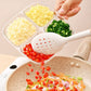 Clear quad-compartment tray filled with chopped vegetables and grated cheese