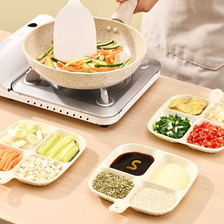 White quad-compartment side dish tray with herb, spice, and veggie sections