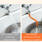Orange faucet extension tube attached to sink tap with chrome connectors